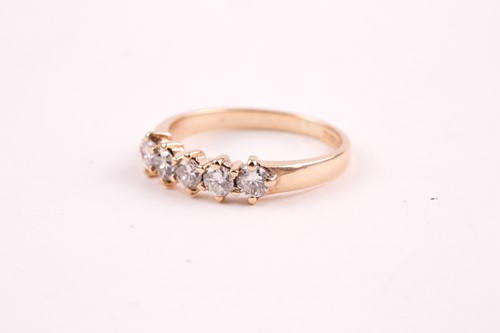 Lot 162 - A 9ct yellow gold and diamond ring, set with...