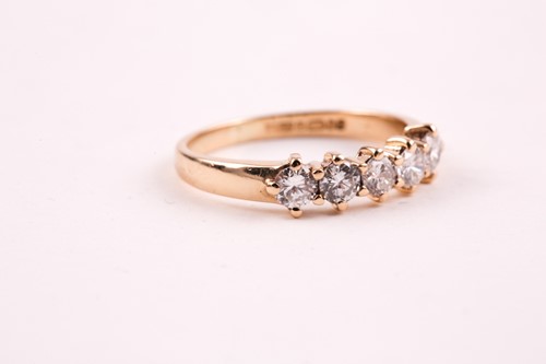 Lot 162 - A 9ct yellow gold and diamond ring, set with...