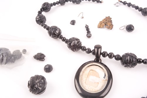 Lot 128 - A Victorian black beaded necklace, with oval...