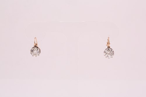 Lot 373 - A pair of Old European cut solitaire diamond...
