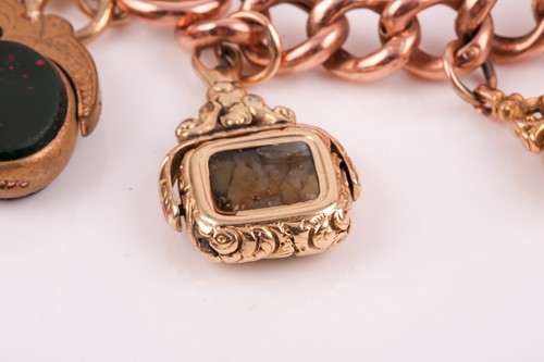 Lot 251 - A 9ct rose gold Victorian curb-link charm...