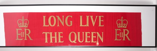 Lot 468 - A large red and gold crepe paper banner from...