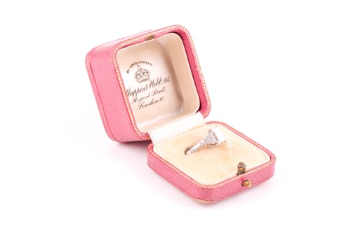 Lot 239 - Mappin & Webb. A platinum and diamond ring in...