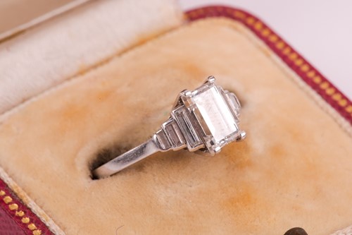 Lot 239 - Mappin & Webb. A platinum and diamond ring in...