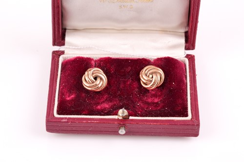 Lot 35 - A pair of 9ct yellow gold knotted earrings,...