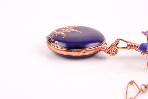 Lot 175 - A 14k yellow gold and cobalt blue enamel fob...