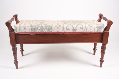 Lot 219 - A Victorian walnut duet stool with turned...