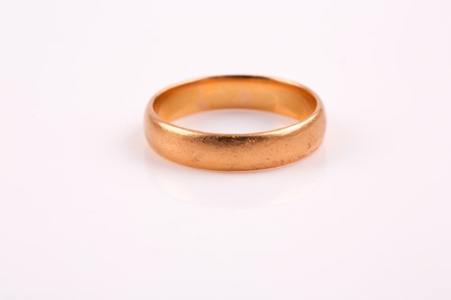 Lot 361 - A plain 22ct gold wedding band. Size P, 5.3 grams