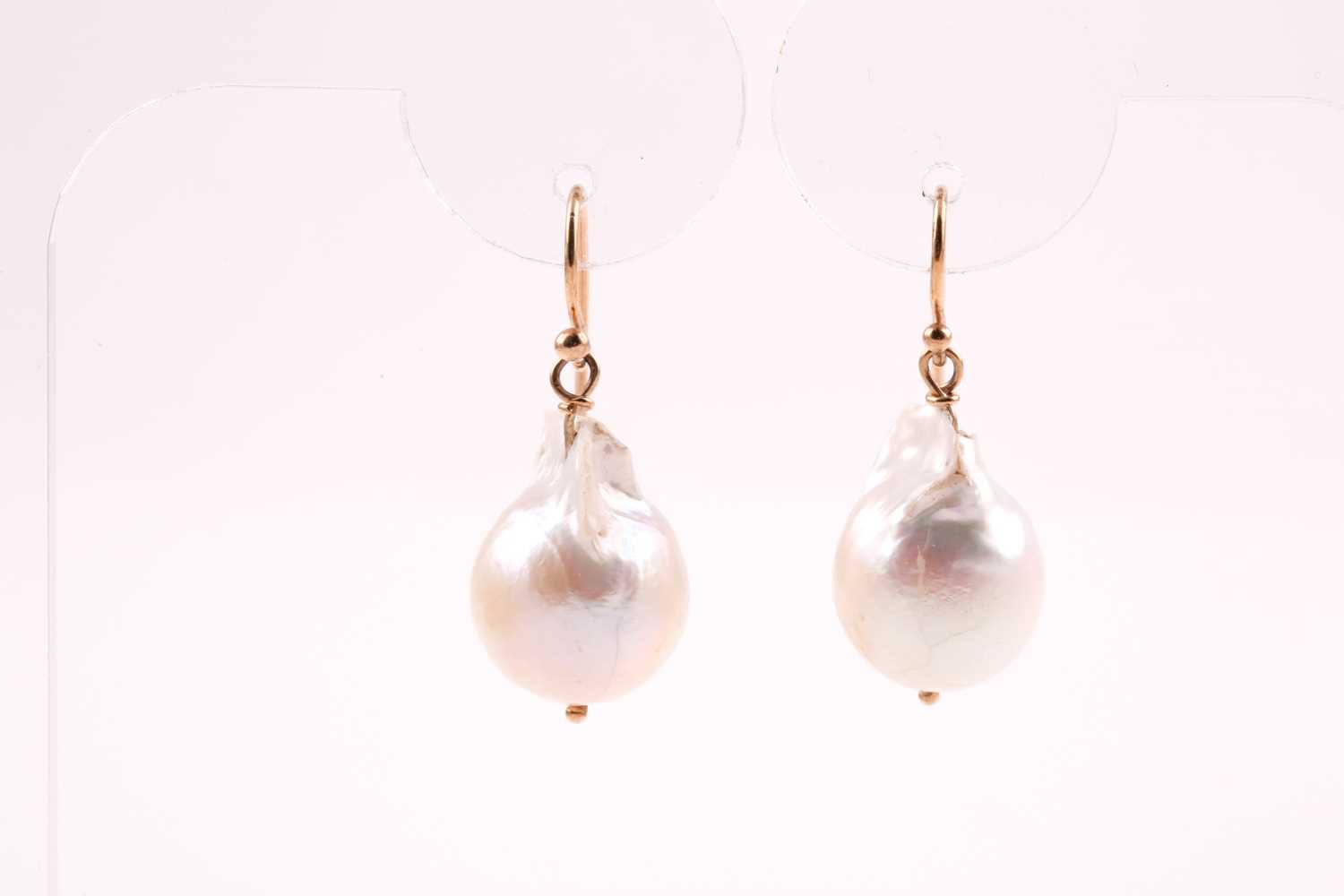 Lot 264 - A pair of yellow metal and baroque pearl drop...