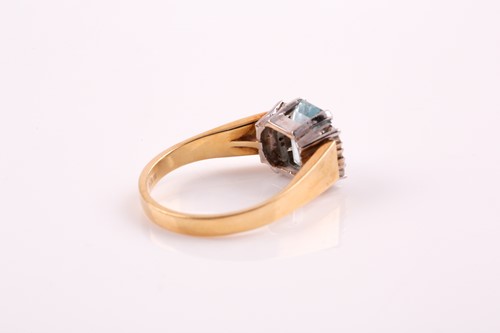 Lot 24 - An aquamarine and diamond ring; the step cut...