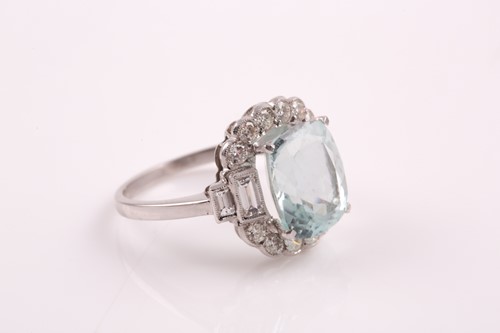 Lot 336 - A platinum, diamond, and aquamarine ring, set...