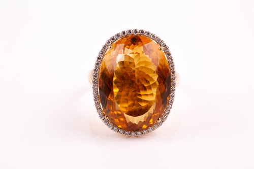 Lot 36 - A 14ct yellow gold, diamond, and citrine...