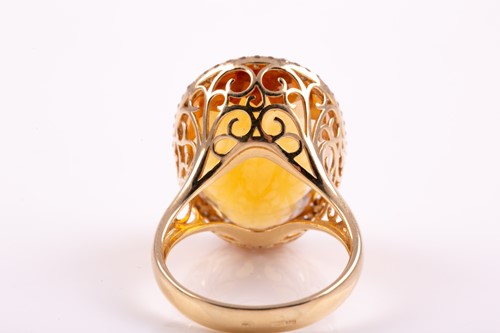 Lot 36 - A 14ct yellow gold, diamond, and citrine...