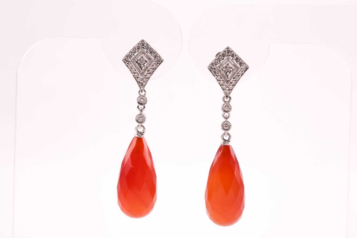 Lot 21 - A pair of diamond and carnelian drop earrings,...
