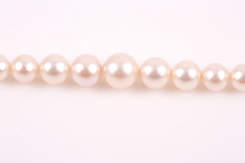 Lot 8 - A graduated cultured pearl necklace, the...