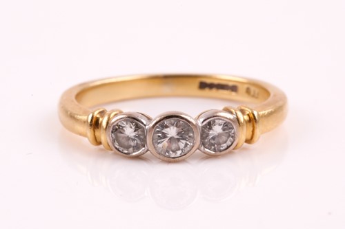 Lot 61 - An 18ct yellow gold and diamond ring, set with...