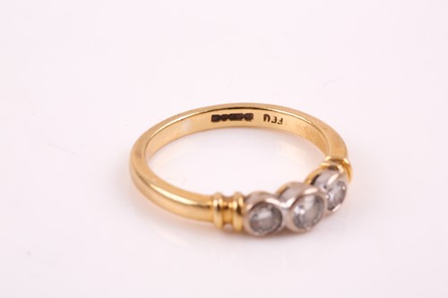 Lot 61 - An 18ct yellow gold and diamond ring, set with...