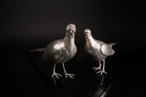 Lot 448 - A modern cast silver cock & hen pheasant,...