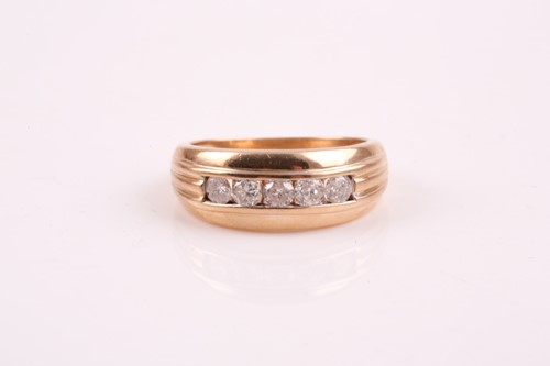 Lot 500 - A 9ct yellow gold and diamond ring, set with...