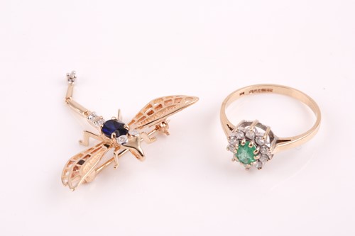 Lot 328 - A 9ct yellow gold, diamond, and emerald...