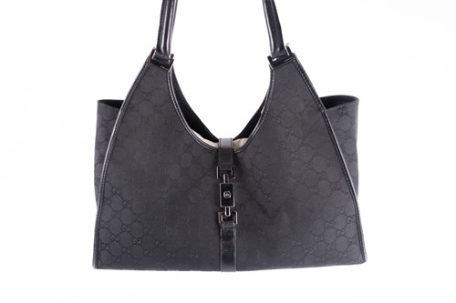 Lot 426 - A Gucci 'Jackie' black leather and canvas...