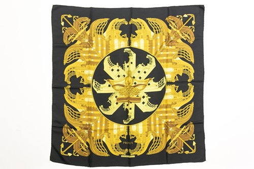Lot 421 - A Hermes "Proues" pattern silk scarf with...