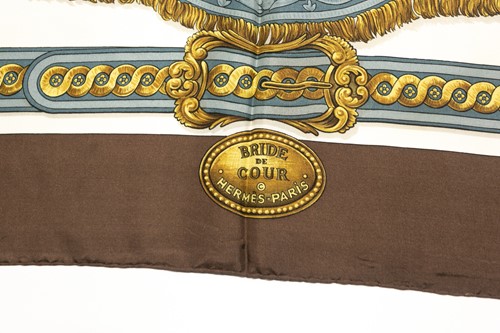 Lot 431 - A Hermes "Bride De Cour" pattern silk scarf,...