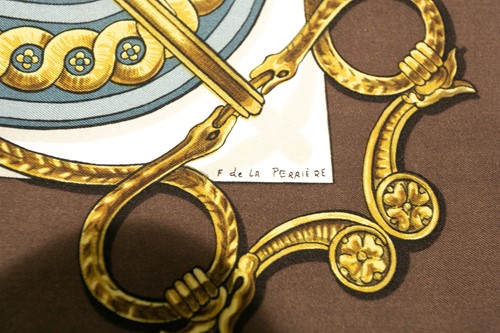 Lot 431 - A Hermes "Bride De Cour" pattern silk scarf,...