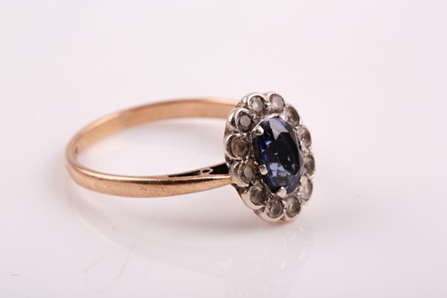 Lot 307 - A 9ct yellow gold, sapphire, and white paste...
