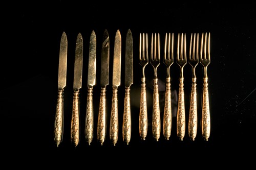 Lot 600 - A set of six Berndorf gilt metal fruit knives...