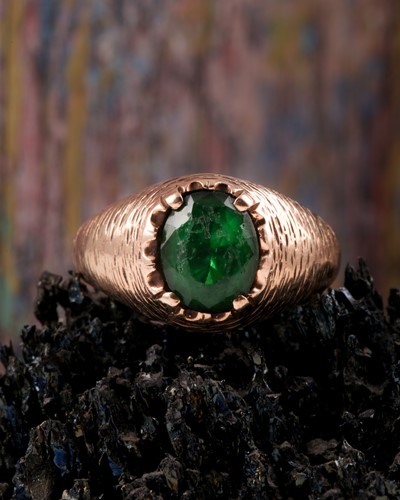 Lot 201 - A unisex yellow metal and green paste stone...