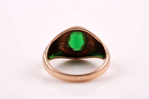 Lot 201 - A unisex yellow metal and green paste stone...