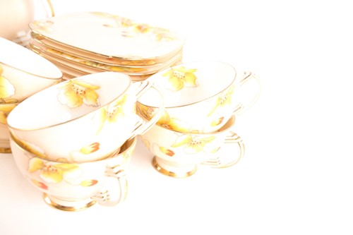 Lot 493 - A 1930s Royal Paragon porcelain tea set, of...