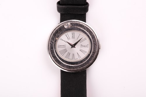 Lot 392 - A Piaget ladies stainless steel watch, the...