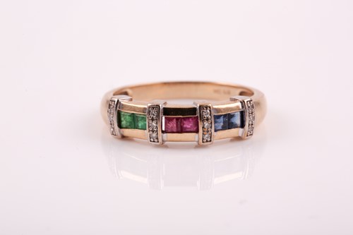 Lot 51 - A 9ct yellow gold, sapphire, ruby, and emerald...