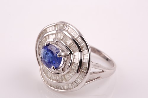 Lot 217 - A silver, diamond, and tanzanite ring, set...