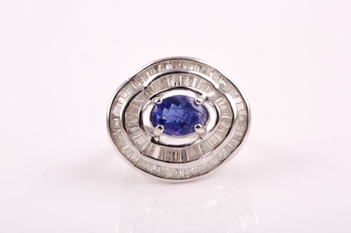 Lot 217 - A silver, diamond, and tanzanite ring, set...