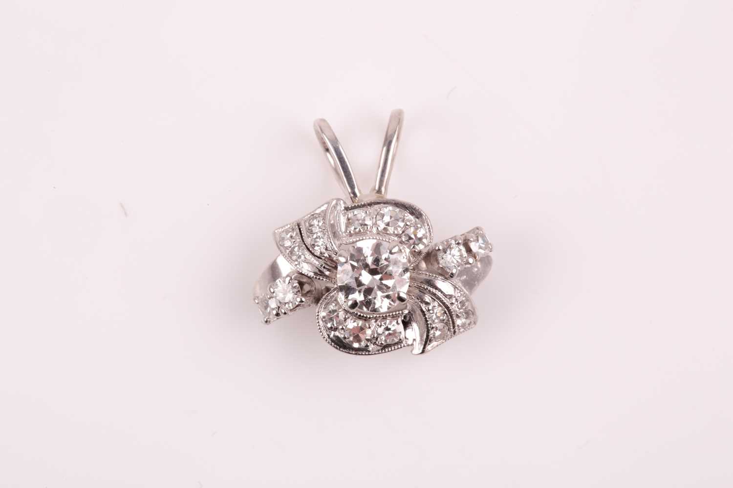 Lot 163 - An unusual diamond pendant, the scrolled...