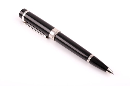 Lot 439 - Cartier. A black and silver rollerball pen,...