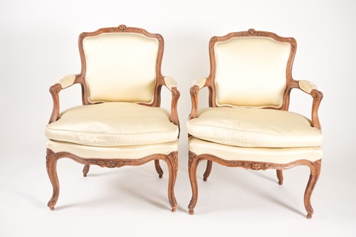 Lot 231 - A pair of French Louis XV carved beechwood...