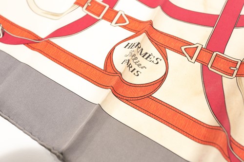 Lot 419 - A Hermes 'Eperon D'Or' silk scarve, in...