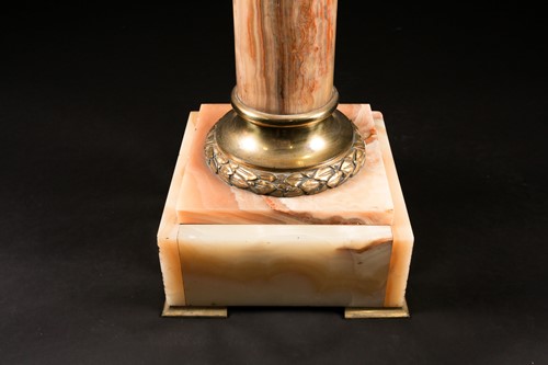 Lot 246 - A late 19th century onyx and gilt metal...