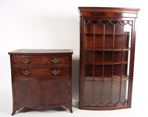 Lot 296 - A George III style mahogany bowfront display...