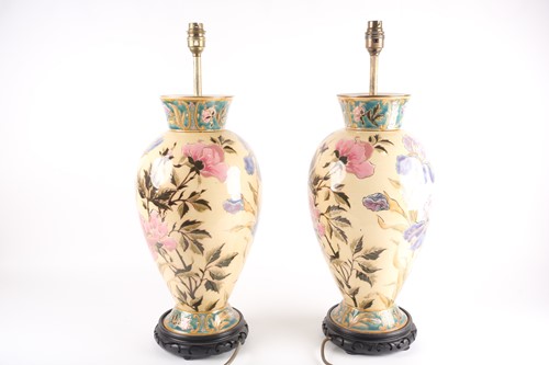 Lot 373 - A pair of pottery table lamps, attributed to...