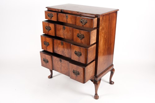 Lot 267 - A Queen Anne styler walnut veneered chest of...