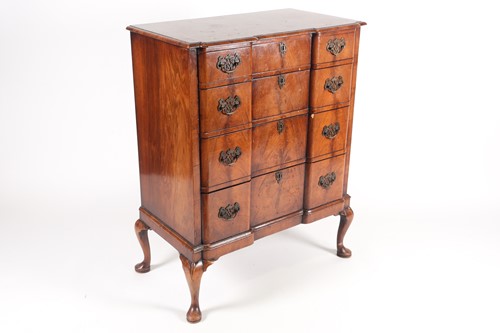 Lot 267 - A Queen Anne styler walnut veneered chest of...