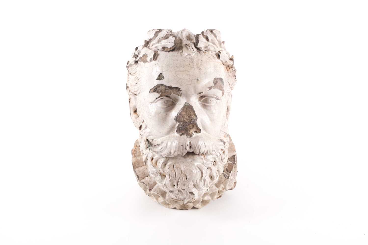 Lot 103 - A 19th-century white glazed pottery head of an...