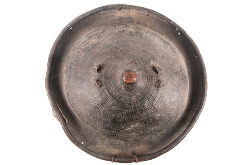 Lot 82 - A 19th century Sudanese, domed circular tooled...