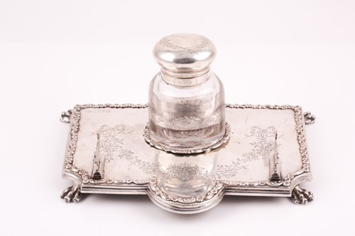 Lot 544 - A silver desk stand, the cut glass inkwell...