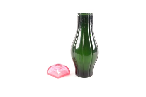 Lot 10 - A Chinese, Peking rose pink carved glass,...